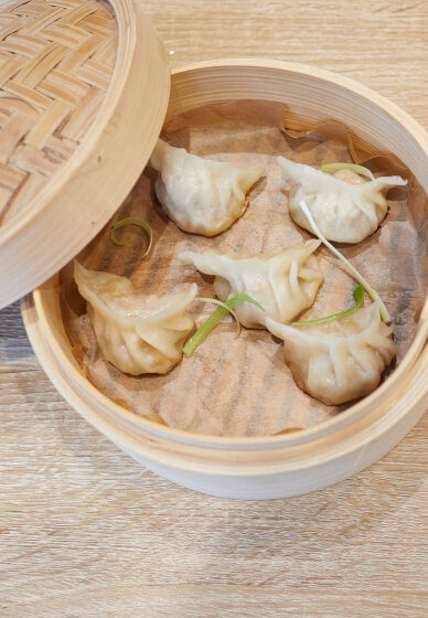 Gyoza dumplings prepared during a dim sum cookery class at Emerge Cookery School.