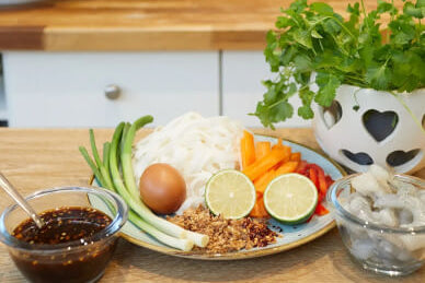 Taste of Thailand cookery class AT Emerge Cookery School London – Thai cooking class participants preparing authentic dishes